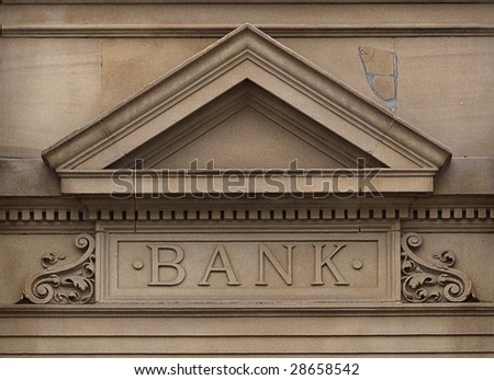 Carved stone bank sign