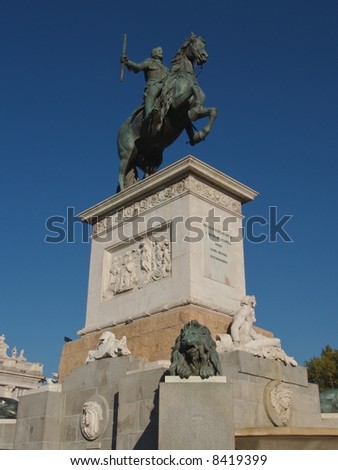 statue outside of back end of palace in Madrid Spain