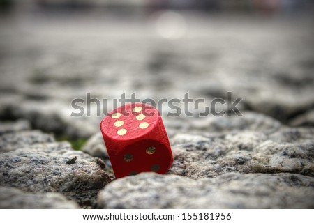 Close-up of a cube on the street * metaphor for prostitution