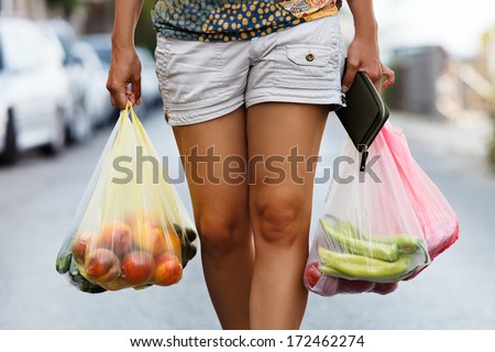 Girl Hands Bag With Fresh Vegetables