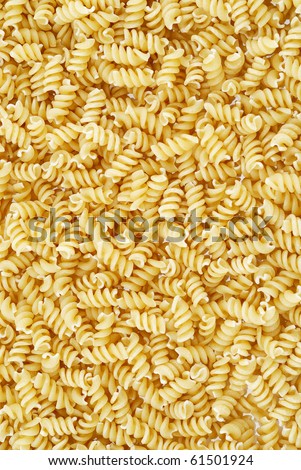 Close-up of italian pasta - spiral shaped, for backgrounds or textures