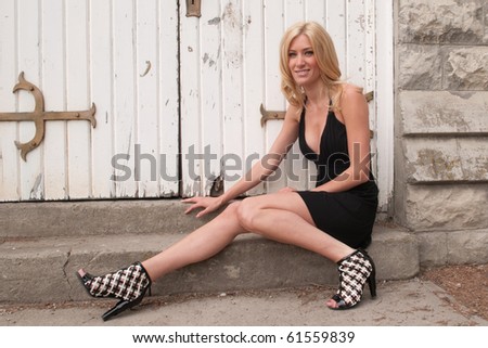Young Woman Sitting on steps