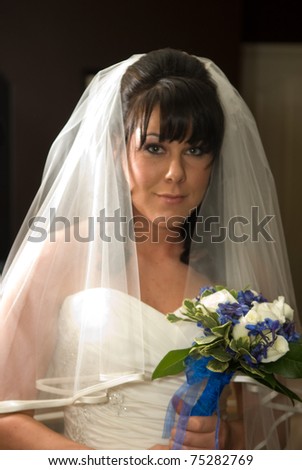 Bride Poses with Slight Smile