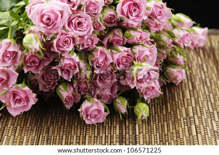 Big Roses Bouquet on woven rattan with natural patterns