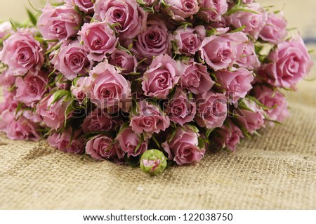 Big Roses Bouquet on sackcloth textured
