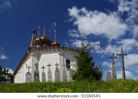 Orthodox church with crosses on the hill relating to the blue sky