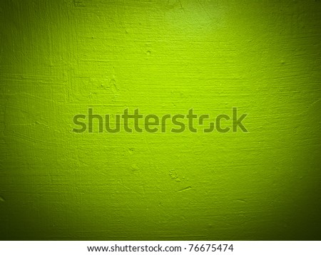 Scratched green paint wall background or texture