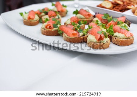 Different snacks as finger food on wedding table