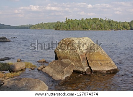 A large rock on the shores of Otterslide Lake in Algonquin Provincial Park, Ontario, Canada.