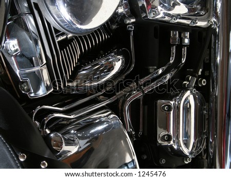 The chrome engine of a motorcycle.