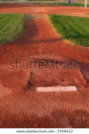 A view from directly behind a pitchers mound.