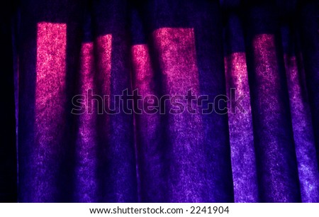 A closeup of funky purple blue curtains.