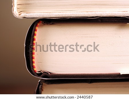 A sideview of a book displaying the binding of the book.