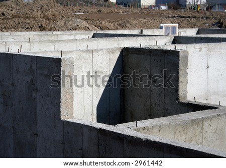 The cement foundation of a new housing development.