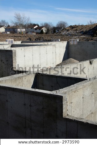 The cement foundation of a new housing development.