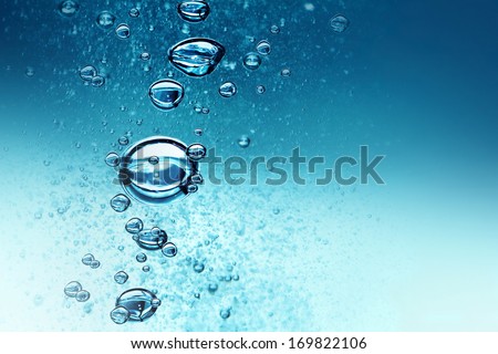 Bubbles Under Water On Blue Background
