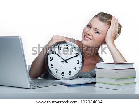 Girl student. Sits at a desktop with the computer.