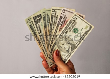 money fan in hand, close up