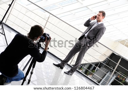 Photographer Shoots A Business Man With Phone