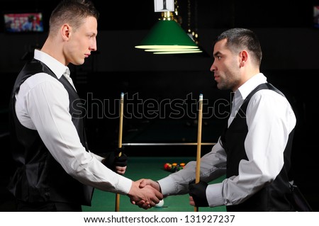 young professional people are welcome to play snooker. Billiards.