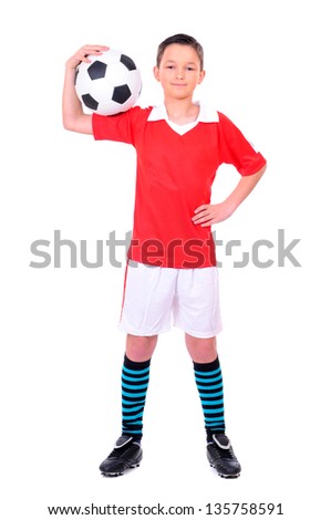 boy playing with football against white background