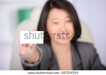 Business woman Asia, working in the office. show business card