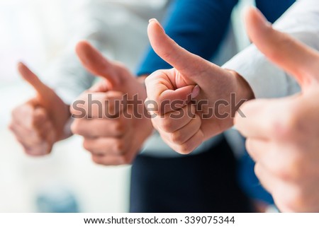 Hands close-up. Group young business people talking at office