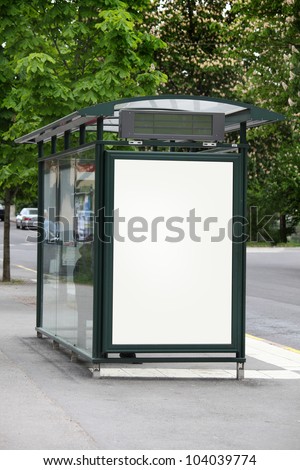 Bus stop with a blank billboard