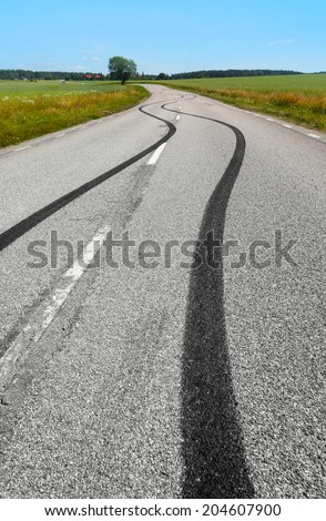 Tire print on the asphalt road