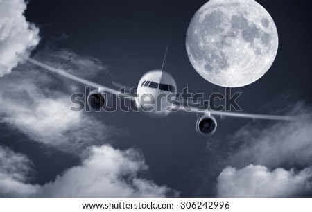 airplane and a full moon