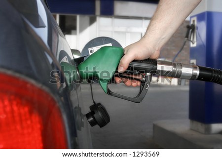 car fueling up