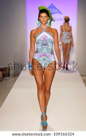 MIAMI - JULY 21: Model walks runway at the XTRA Life Lycra Brand Swimwear Collection for Spring/ Summer 2013 during Mercedes-Benz Swim Fashion Week on July 21, 2012 in Miami, FL