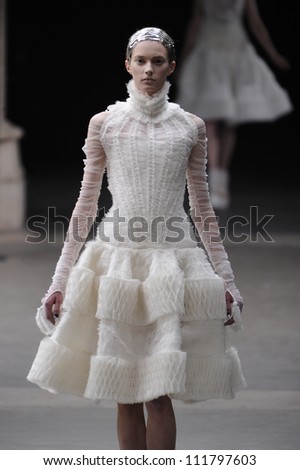 PARIS, FRANCE - MARCH 08: A model walks runway during the Alexander McQueen Ready to Wear Autumn/Winter 2011/2012 show during Paris Fashion Week at La Conciergerie on March 8, 2011 in Paris, France.