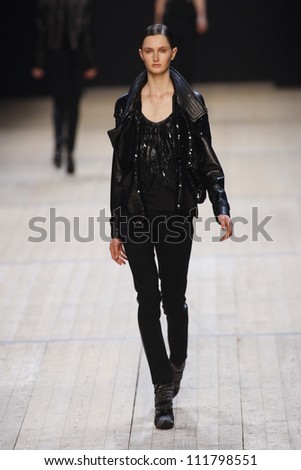 PARIS, FRANCE - MARCH 03: A model walks the runway during the Barbara Bui Ready to Wear Autumn/Winter 2011/2012 show during Paris Fashion Week at Pavillon Concorde on March 3, 2011 in Paris, France.