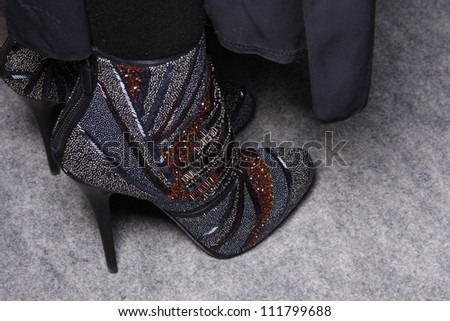 PARIS, FRANCE - MARCH 03: A model shoes backstage before the Barbara Bui Ready to Wear Autumn/Winter 2011/2012 show during Paris Fashion Week at Pavillon Concorde on March 3, 2011 in Paris, France.