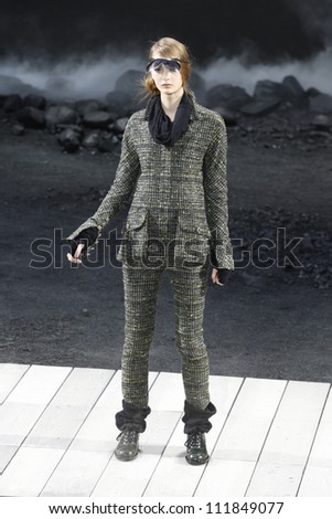 PARIS, FRANCE - MARCH 08: A model walks the runway during the Chanel Ready to Wear Autumn/Winter 2011/2012 show during Paris Fashion Week at Grand Palais on March 8, 2011 in Paris, France.