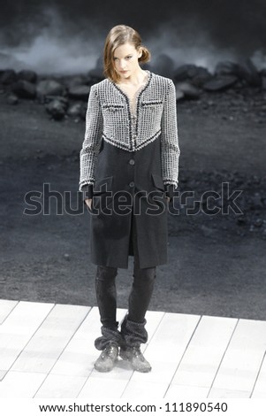PARIS, FRANCE - MARCH 08: A model walks the runway during the Chanel Ready to Wear Autumn/Winter 2011/2012 show during Paris Fashion Week at Grand Palais on March 8, 2011 in Paris, France.