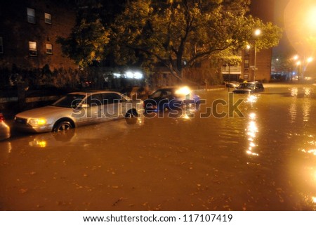 BROOKLYN, NY - OCTOBER 29: Flooded streets, caused by Hurricane Sandy, are seen on October 29, 2012, in the corner of Brigham street and  Shore Pway of Brooklyn NY, United States.