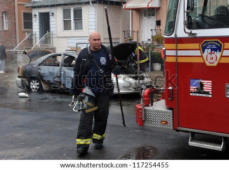 BROOKLYN, NY - OCTOBER 30: Fire department people fought fire in the Sheapsheadbay neighborhood due to flooding from Hurricane Sandy in Brooklyn, New York, U.S., on Tuesday, October 30, 2012.
