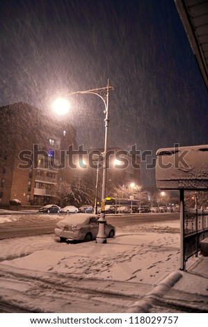 NEW YORK, NY - NOVEMBER 07: Snow falls on damaged cars and streets as a Nor\'Easter arrives just ten days after Superstorm Sandy ravaged the tri-state area.  November 7, 2012 in the Brooklyn, NY