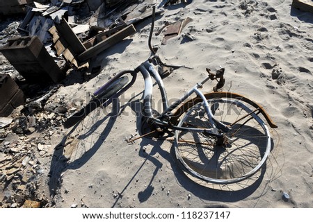NEW YORK, NY - NOVEMBER 09: Burned bicycle as remaining scene of Hurricane Sandy\'s aftermath in the Breezy Point part of Far Rockawayon November 9, 2012 in the Queens borough of New York City.