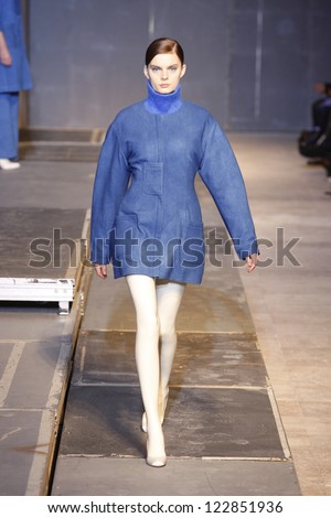 PARIS - MARCH 1: A model walks the runway during the Aganovich Ready to Wear Autumn/Winter 2011/2012 show during Paris Fashion Week at Palais De Tokyo on March 1, 2011 in Paris, France