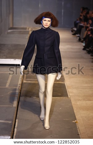 PARIS - MARCH 1: A model walks the runway during the Aganovich Ready to Wear Autumn/Winter 2011/2012 show during Paris Fashion Week at Palais De Tokyo on March 1, 2011 in Paris, France