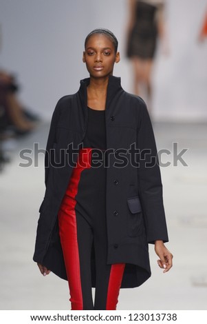 PARIS, FRANCE - MARCH 04: A model walks the runway during the Amaya Arzuaga Ready to Wear Autumn/Winter 2011/2012 show during Paris Fashion Week on March 4, 2011 in Paris, France