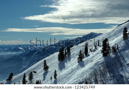 On the top of the World - Snow and Sky. Snowbasin mountain, Utah