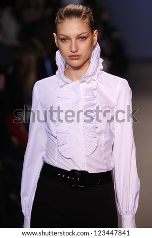 PARIS, FRANCE - MARCH 6: A model walks the runway during the Andrew GN Ready to Wear Autumn/Winter 2011/2012 show during Paris Fashion Week on March 6, 2011 in Paris, France