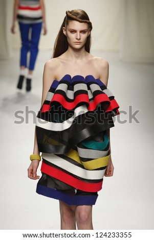 PARIS, FRANCE - MARCH 07: A model walks the runway during the Comuun Ready to Wear Autumn/Winter 2011/2012 show during Paris Fashion Week on March 7, 2011 in Paris, France