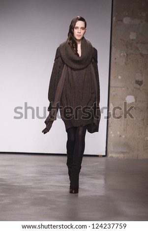 PARIS, FRANCE - FEBRUARY 29: A model walks the runway during the Atsuro Tayama Ready to Wear Fall/Winter 2011 show as part of the Paris Fashion Week on February 29, 2012 in Paris, France