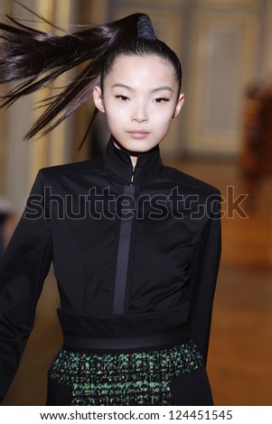 PARIS - MARCH 08: A model walks the runway during the Emmanuel Ungaro Ready to Wear show as part of the Paris Womenswear Fashion Week Fall/Winter 2011 at Hotel Westin on March 8, 2010 in Paris, France
