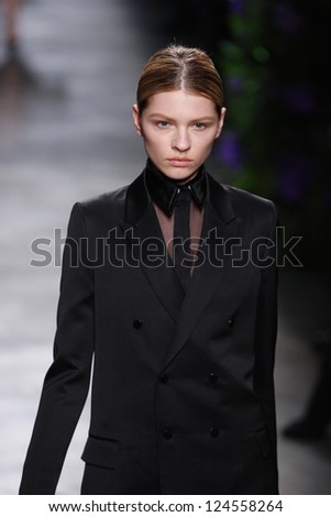PARIS, FRANCE - MARCH 06: A model walks the runway at the Givenchy fashion show during Paris Fashion Week on March 6, 2011 in Paris, France.